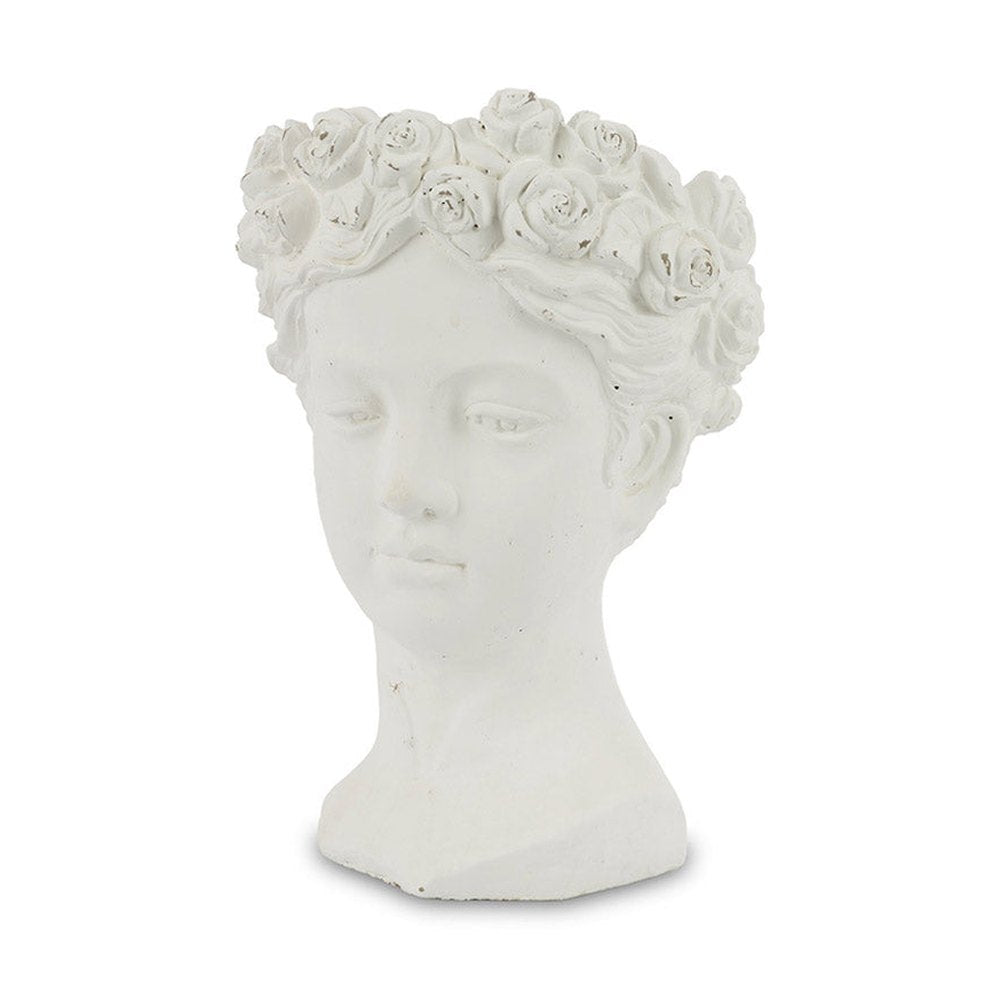 Antikolt felületű, krém színű kaspó büszt.