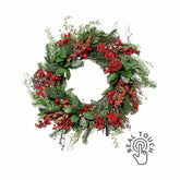 Mesterséges mű nobilis fenyőágakból, bukszuslevelekből és bogyókból készült karácsonyi koszorú ajtódísz.