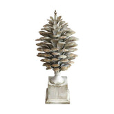 Shabby Chic stílusú, 67 cm magas, antikolt krémszínű, patinás felületű, fém toboz dísz talapzaton.