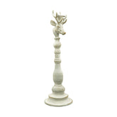 Vintage stílusú, rusztikus patinás felületű, antik fehér színű, szarvasfejjel díszített fém gyertyatartó.