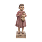 Vintage stílusú, antikolt felületű kislányfigura babával