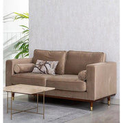 Pezsgőszínű bársonnyal kárpitozott, 2 személyes kanapé.