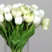 Mű tulipán csokor, henger formájú üvegvázában.