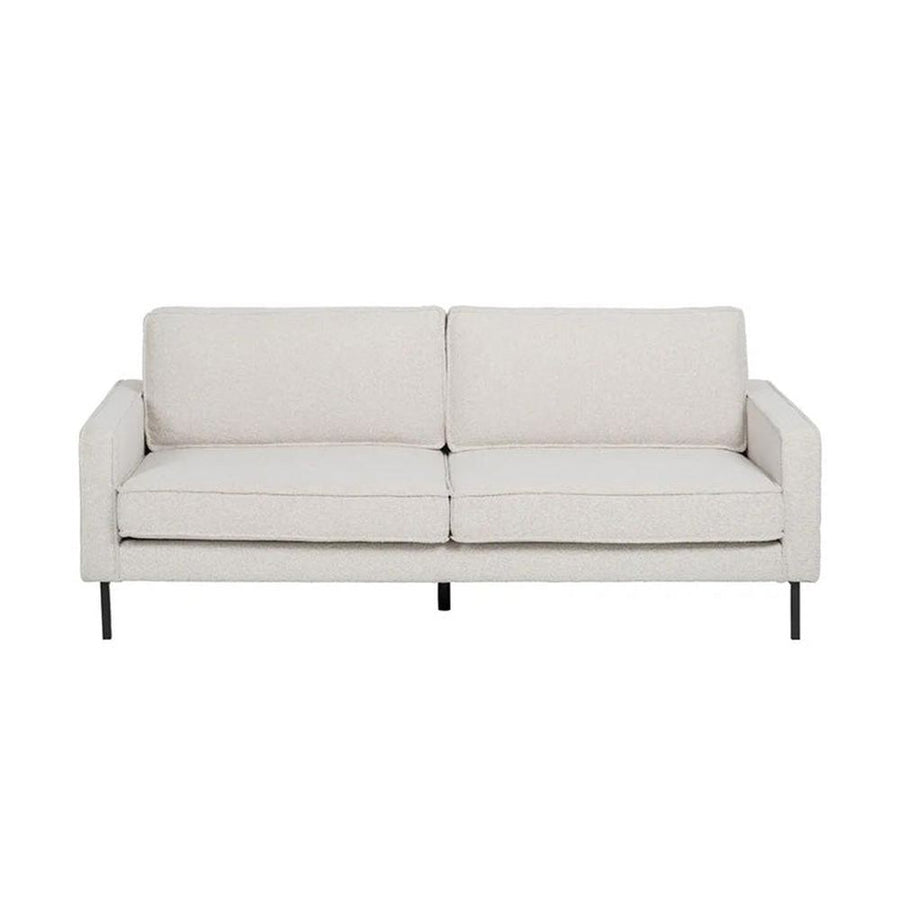 Fehér színű szövettel kárpitozott, 3 személyes kanapé.