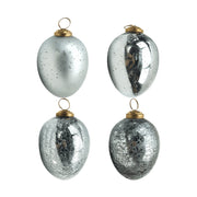 4 féle, antikolt felületű ezüstszínű üveg tojás.