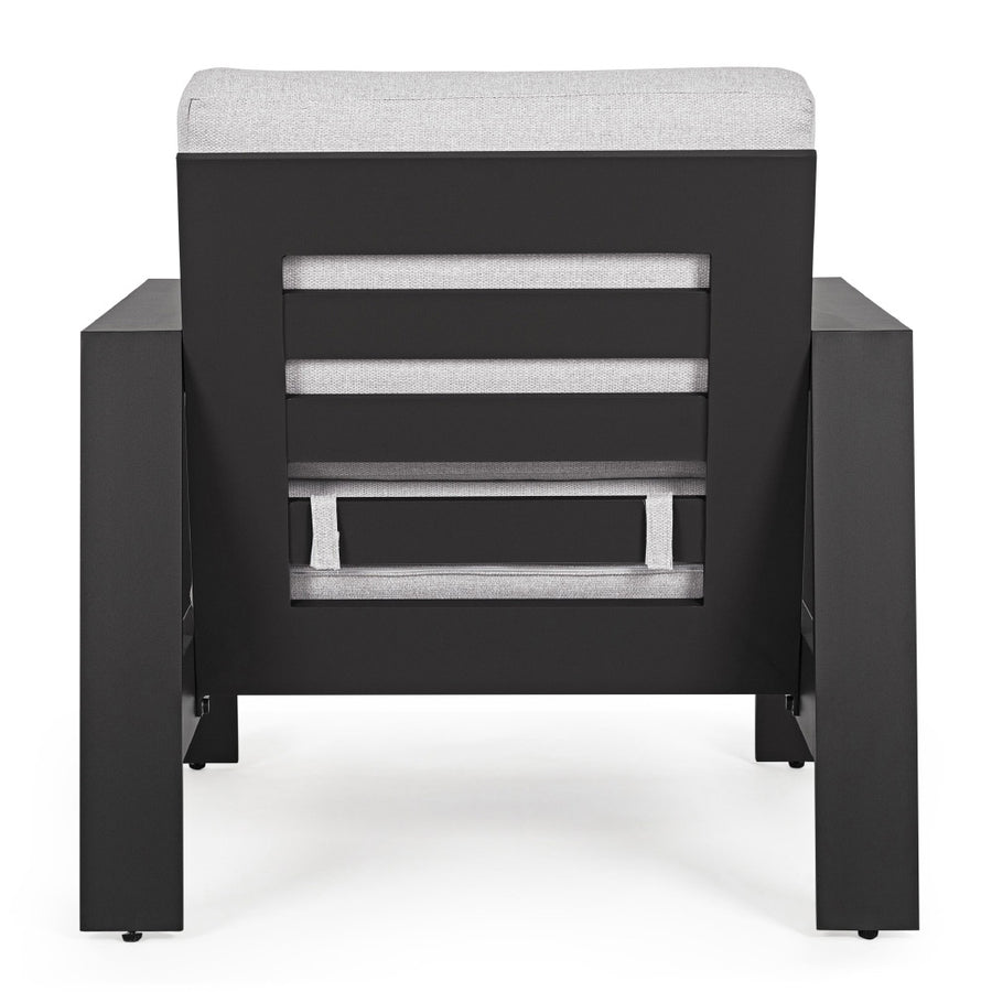 A kortárs stílusú, fekte-fehér színű ülőgarnitúra fotel tagja.