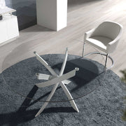 Kortárs stílusú, fehér színű, rozsdamentes acélból készült, formatervezett étkezőasztal edzett üveglappal.