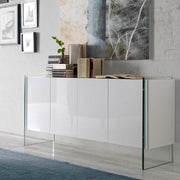 Kortárs stílusú, magasfényű, fehér színű lakkal festett, dizájn komódszekrény edzett üveg lábakkal.