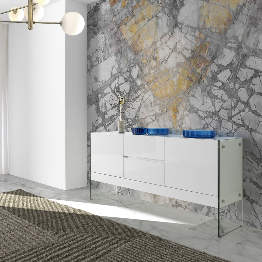 Kortárs stílusú,magasfényű, fehér lakkal festett, dizájn komódszekrény edzett üveg lábakkal.