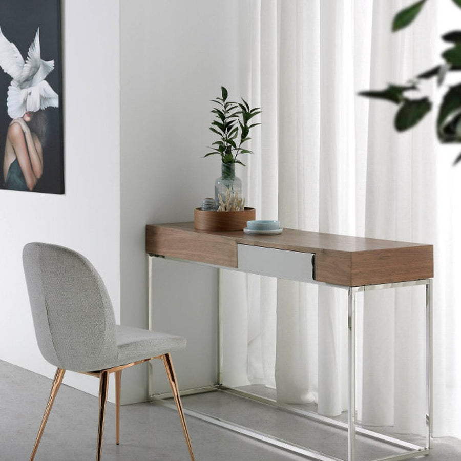 Kortárs stílusú, diófa furnérral borított, dizájn konzolasztal rozsdamentes acél lábakkal.