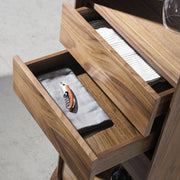 Kortárs stílusú, diófa furnérral borított, forgatható, dizájn bárszekrény.