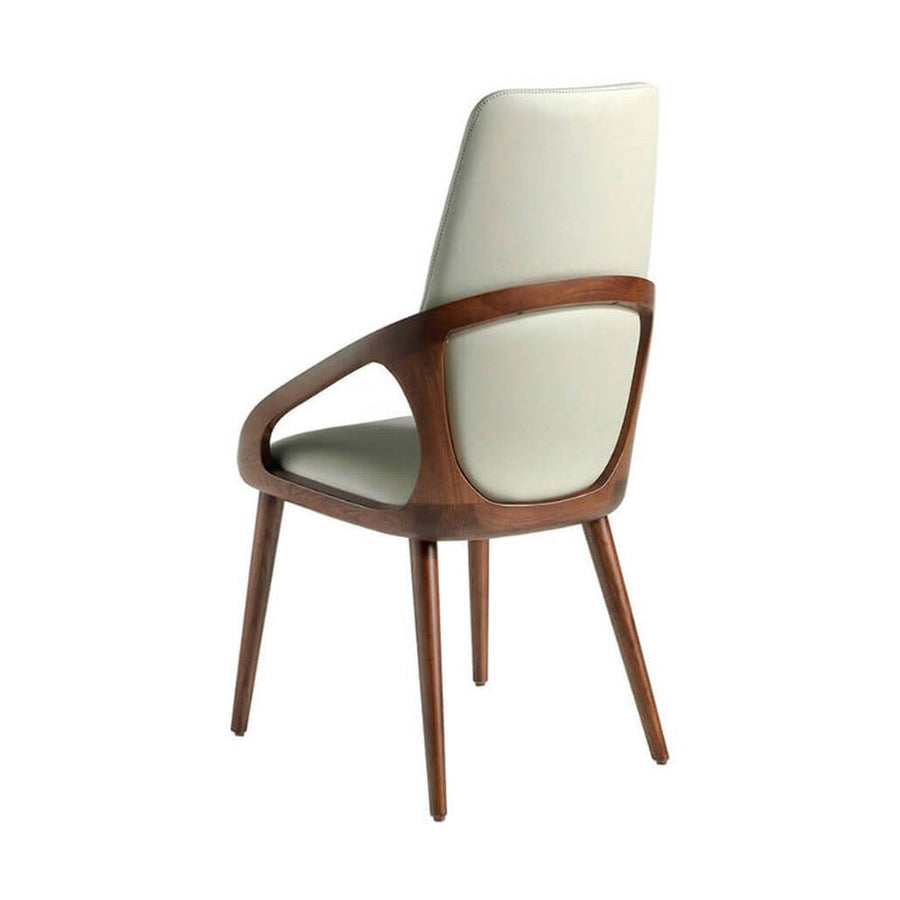Krémszínű műbőrrel kárpitozott, kőrisfából készült, formatervezett dizájn étkezőszék.