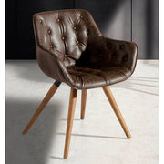 Barna műbőrrel kárpitozott, kőrisfából készült, formatervezett dizájn étkezőszék.