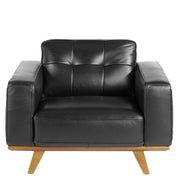 Kortárs stílusú, fekete bőrrel kárpitozott, dizájn fotel diófa lábakkal.