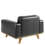 Kortárs stílusú, fekete bőrrel kárpitozott, dizájn fotel diófa lábakkal.
