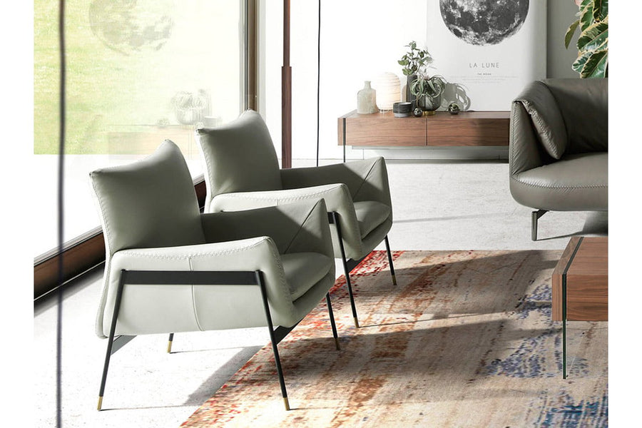 Kortárs stílusú, törtfehér színű, bőr dizájn fotel. acél szerkezettel