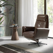 Kortárs stílusú, dohánybarna színű bőrrel kárpitozott, dizájn, forgó pihenőfotel.