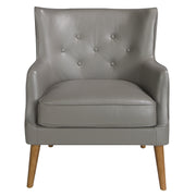 Kortárs stílusú, hamuszürke bőrrel kárpitozott, dizájn fotel, kőrisfa lábakkal