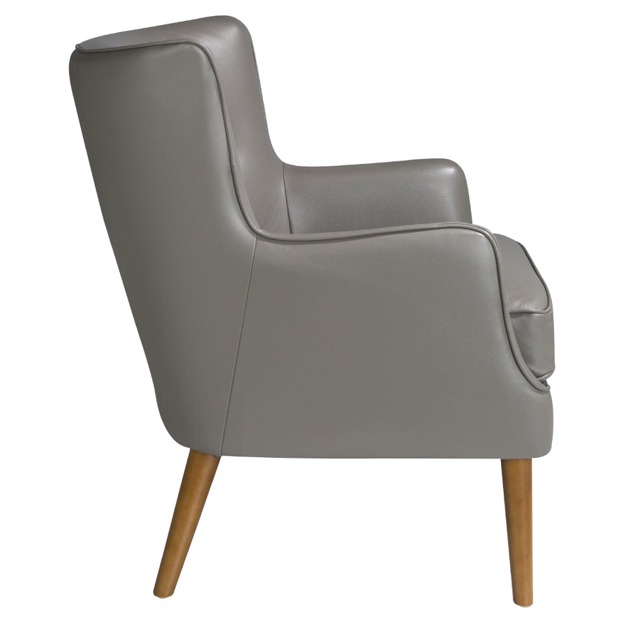 Kortárs stílusú, hamuszürke bőrrel kárpitozott, dizájn fotel, kőrisfa lábakkal
