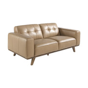 Kortárs, homokszínű bőrrel kárpitozott, fenyőfaszerkezetes,  dizájn kanapé.