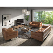 Kortárs, agyagbarna színű bőrrel kárpitozott, dizájn kanapé acéllábakkal.