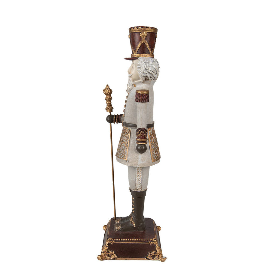 Klasszikus stílusú, 42 cm magas, karácsonyi diótörő figura díszes talapzaton