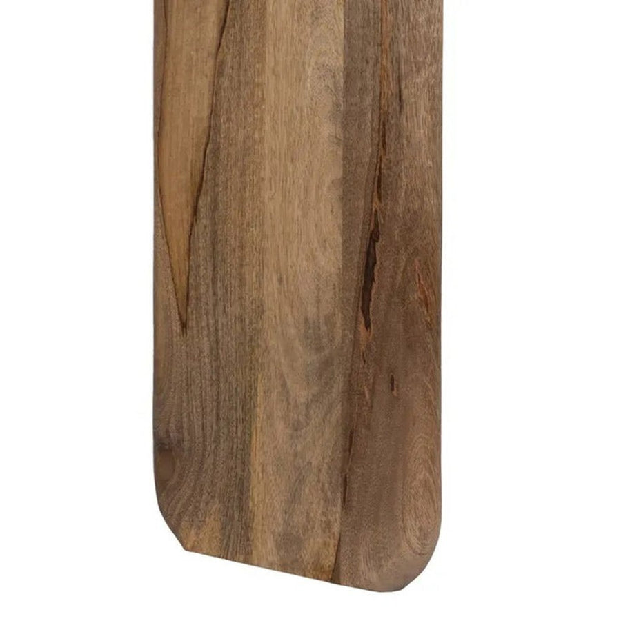 A kortárs stílusú, mangófából készült, natúr és sötétbarna színű étkezőasztal lábának részlete.