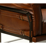 Loft stílusú, fekete színű, fémszerkezettel rendelkező, dohánybarna színű, bőrkanapé.