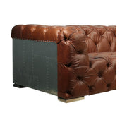 Négy személyes, kortárs-retró stílusú, barna színű marhabőrkanapé, szegecselt alumínium burkolattal