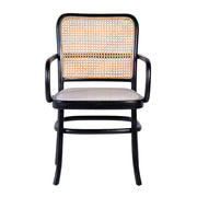 Koloniál stílusú, fekete színű, teakfa étkezőszék rattan háttámlával és bézs ülőfelülettel.