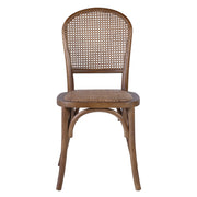 Koloniál stílusú, tölgyfából készült étkezőszék rattan ülőfelülettel és háttámlával.