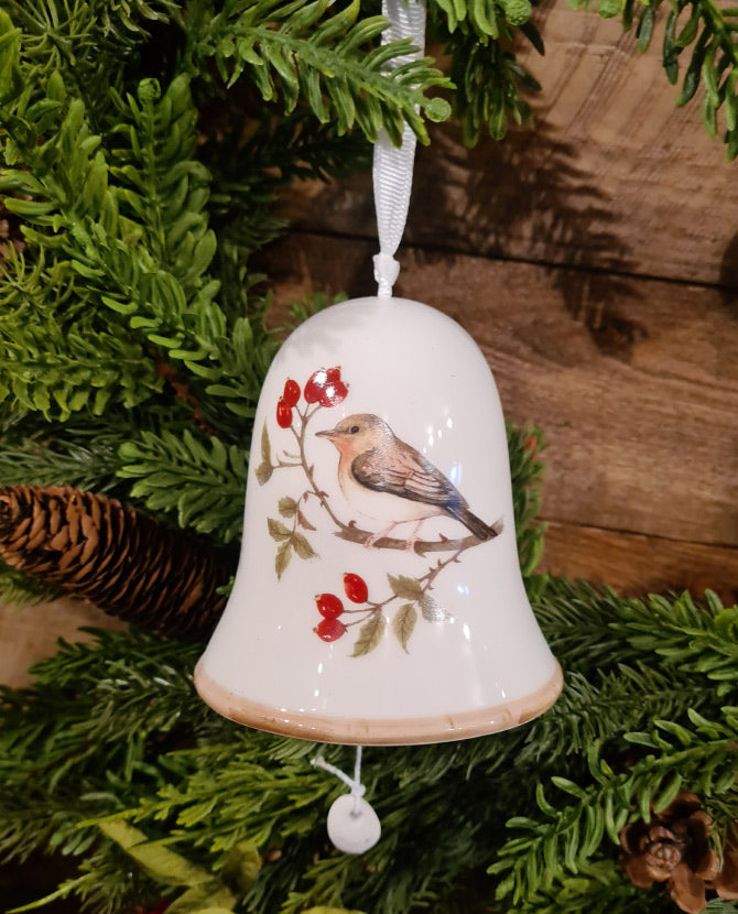 Téli énekesmadárral díszített karácsonyi kerámia harang.
