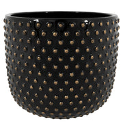 Modern stílusú, fekete színű, mázas kerámia kaspó aranyszínű, pöttyös dombormintával