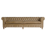 Vintage stílusú, fenyőfa szerkezetű, barna színű bőrrel kárpitozott Chesterfield kanapé.