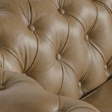 Vintage stílusú, fenyőfa szerkezetű, barna színű bőrrel kárpitozott Chesterfield kanapé.