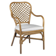 Mediterrán stílusú, rattanból készült, natúr színű kézműves karosszék ülőpárnával.