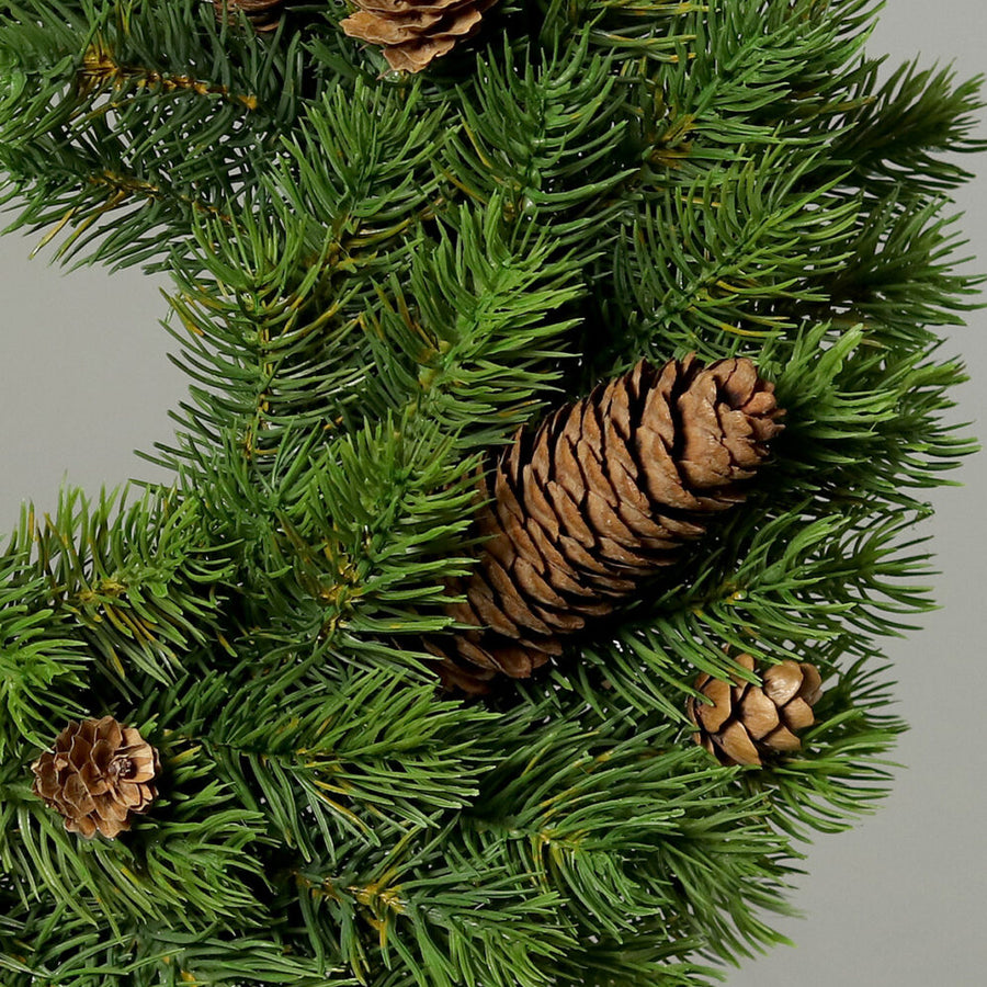 Zöld színű, mű jegenyefenyő koszorú.