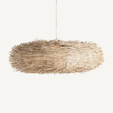 Fészek formájú kézműves design függeszték lámpa rattanból.