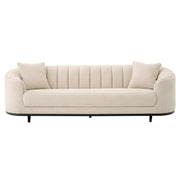 Bézs színű szövettel kárpitozott, 3 személyes dizájn kanapé .