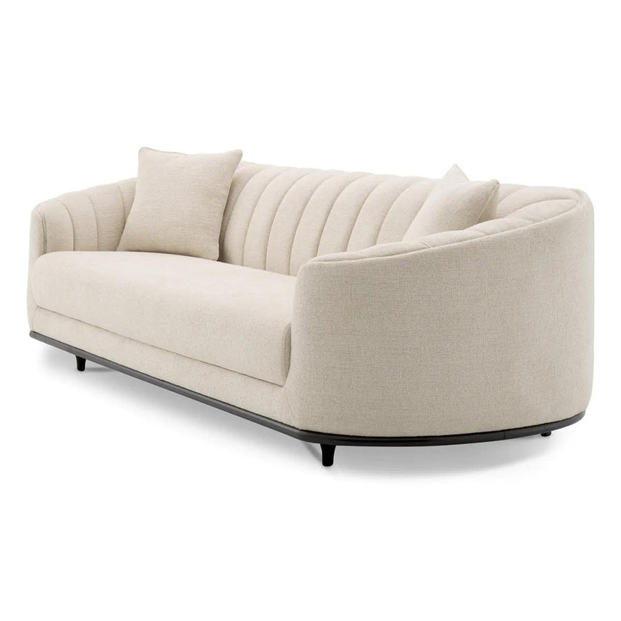 Bézs színű szövettel kárpitozott, 3 személyes dizájn kanapé .