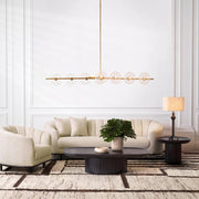 Bézs színű szövettel kárpitozott, 3 személyes dizájn kanapé .