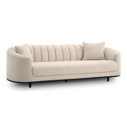 Bézs színű szövettel kárpitozott, 3 személyes dizájn kanapé .