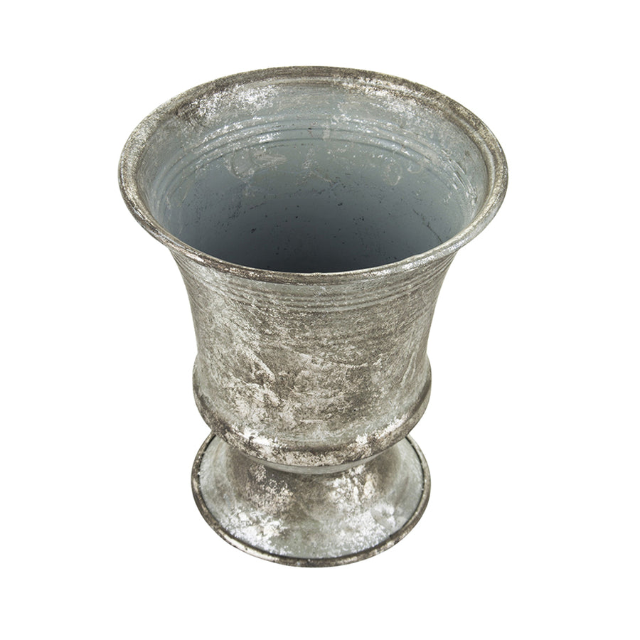 Ezüstszínű fém kaspó.