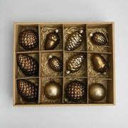 Antique kollekció 12 db-os bronz üveg karácsonyfadísz szett kartondobozban, szalmával bélelt rekeszekben elhelyezve.