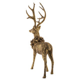 Elegáns arany szarvas figura háromnegyedes nézetben
