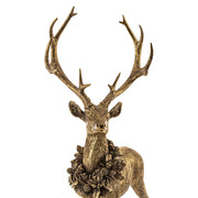 Arannyal antikolt szarvas hátulnézetben, látványos agancsokkal