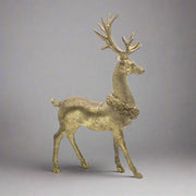 Antikolt felületű, aranyszínű, karácsonyi szarvas figura.