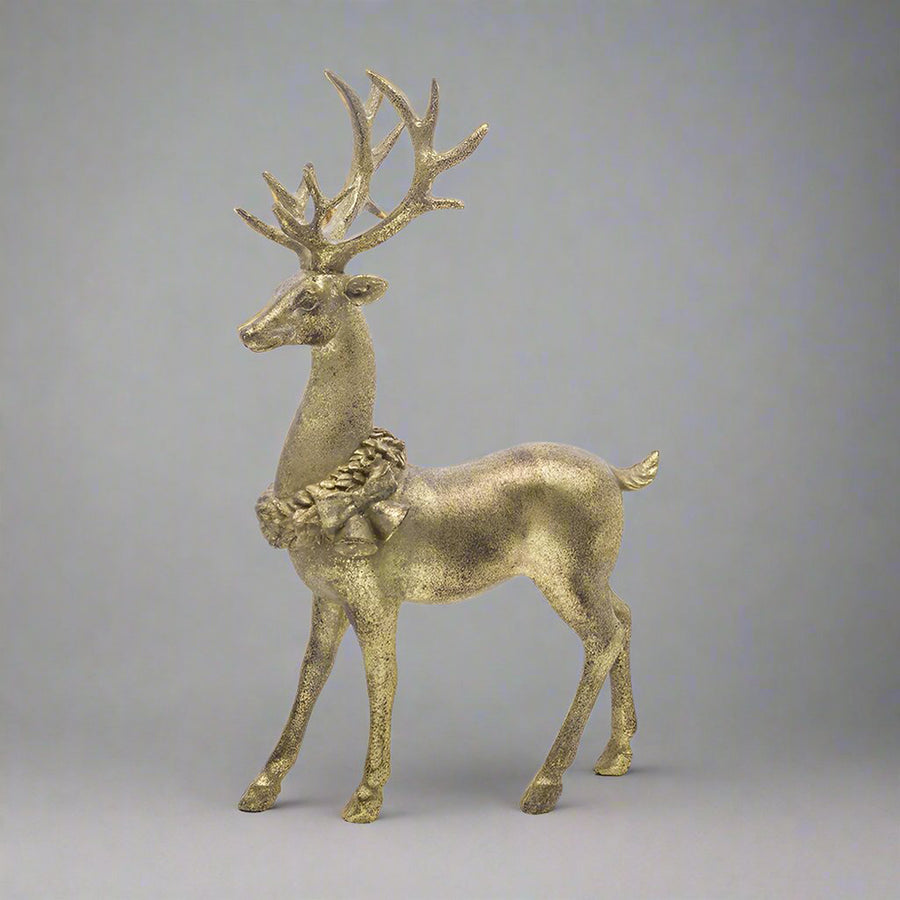 Antikolt felületű, aranyszínű, karácsonyi szarvas figura.
