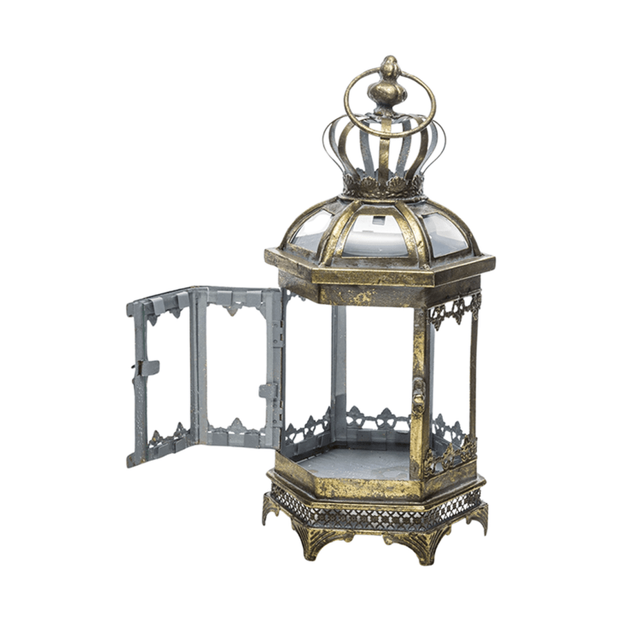 Díszes, antikolt felületű, óarany színű fém lámpás.