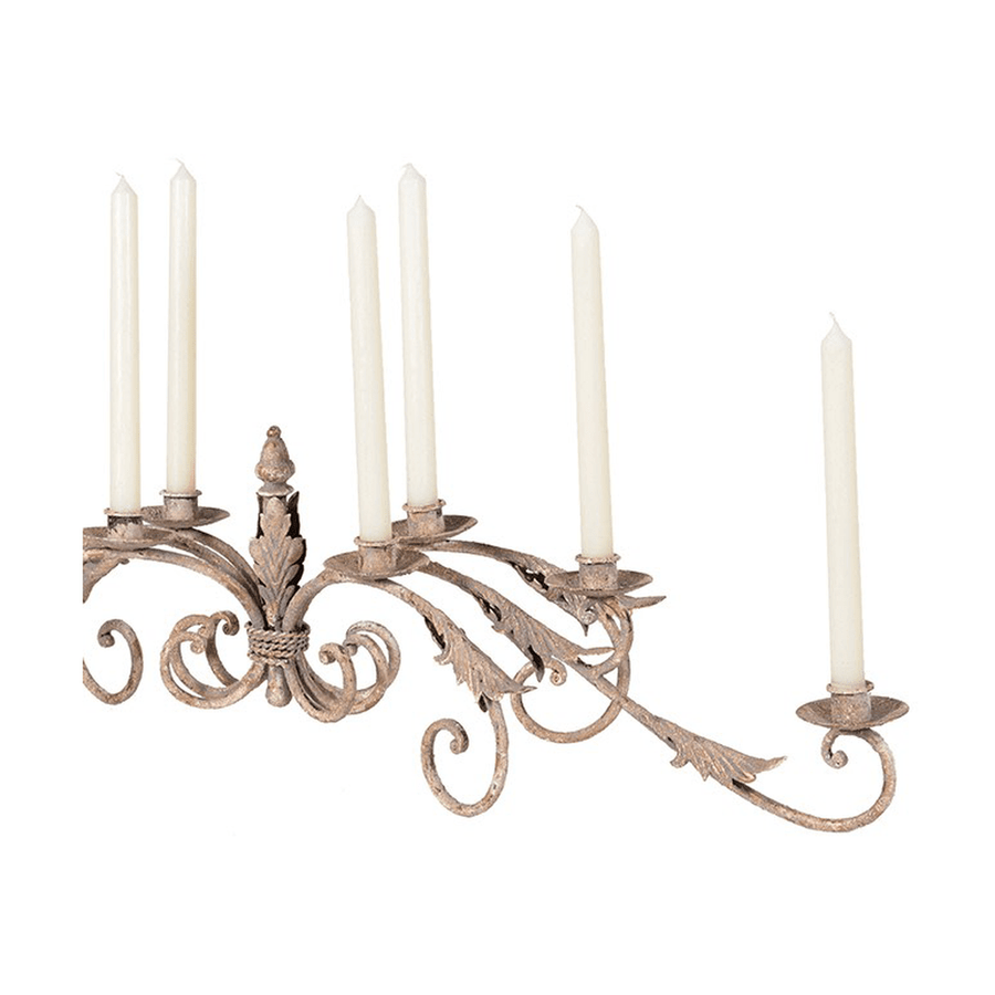 Antikolt felületű, krémszínű, 8 ágú, fém gyertyatartó.